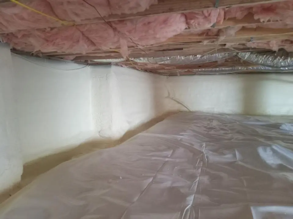 Crawl space encapsulation with closed-cell spray foam for Commercial Roof Restoration in Palmerton